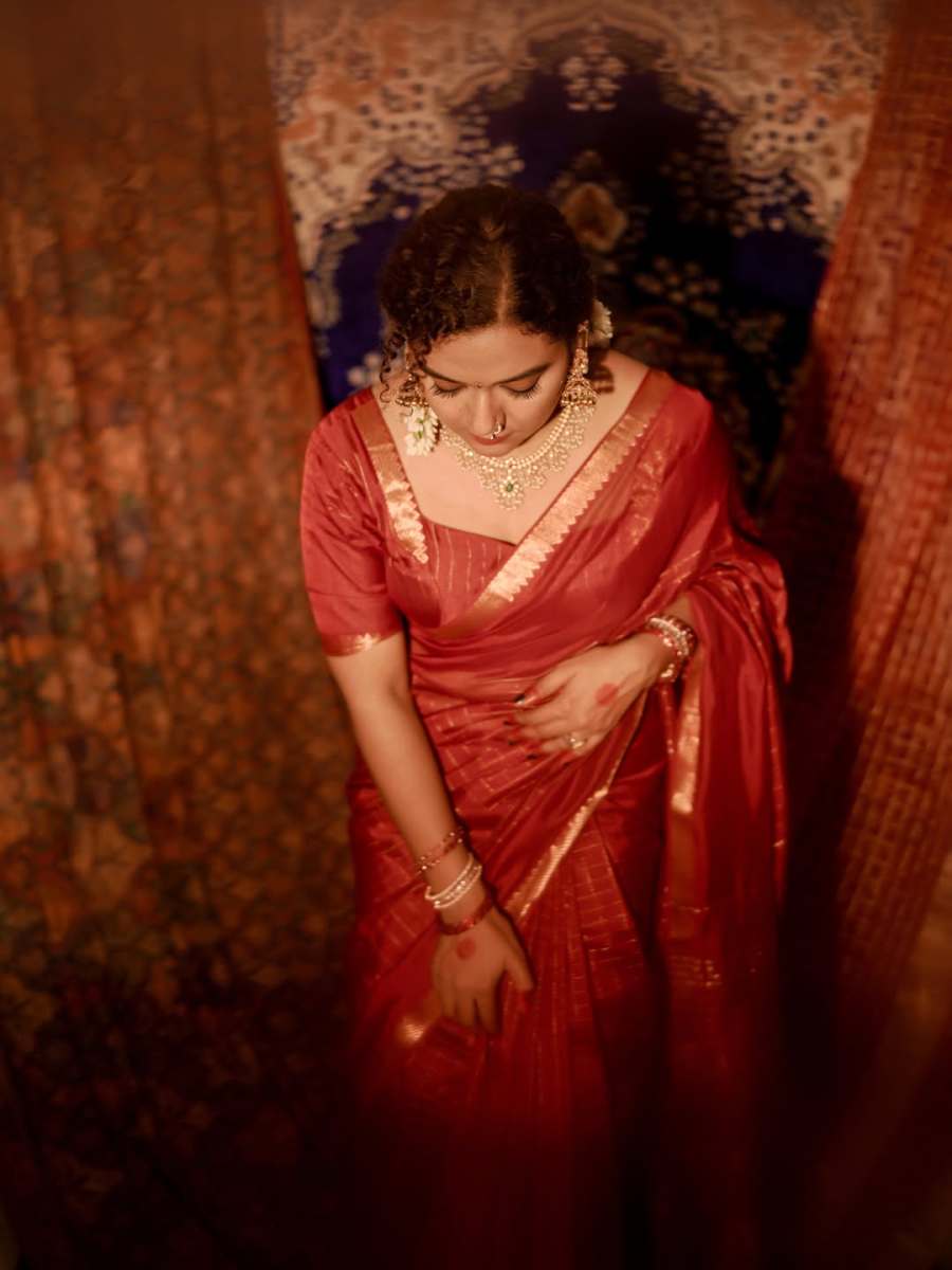 mareena-michael-kurisingal-in-red-saree-traditional-style-images-003