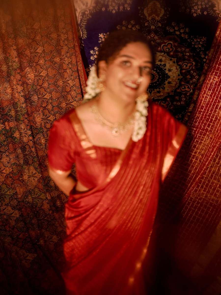 mareena-michael-kurisingal-in-red-saree-traditional-style-images-004