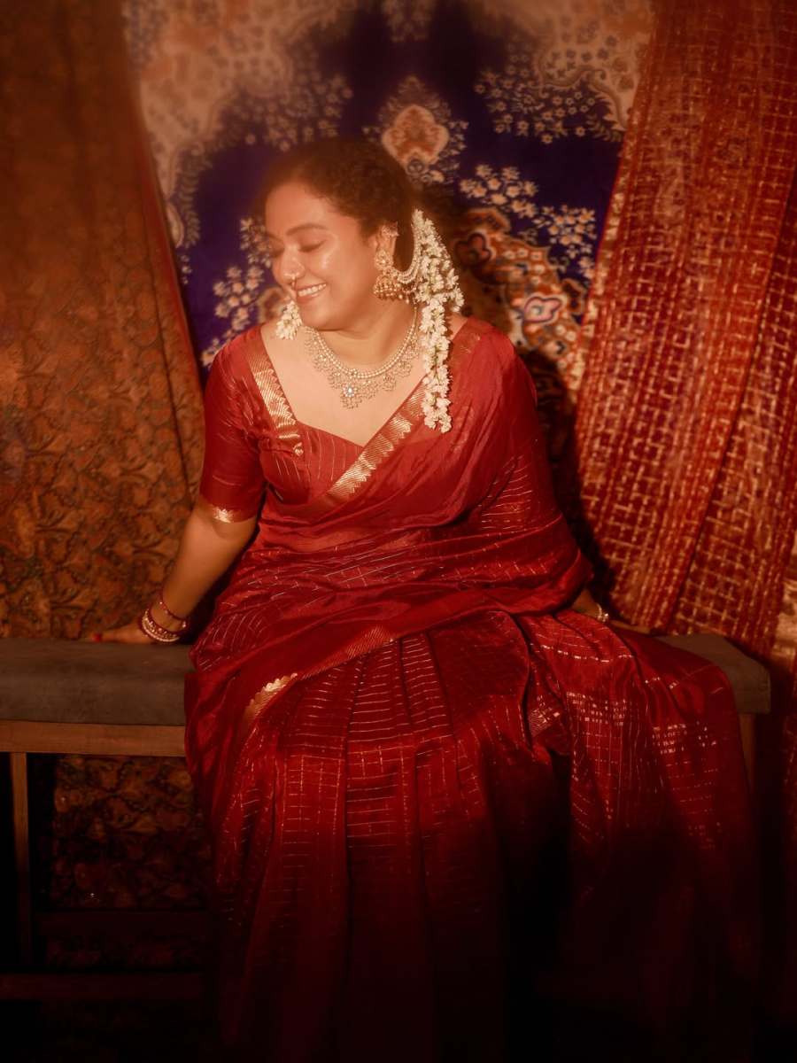 mareena-michael-kurisingal-in-red-saree-traditional-style-images-009