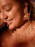 mareena-michael-kurisingal-in-red-saree-traditional-style-images-012
