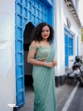 mareena-michael-kurisingal-in-sky-colour-party-wear-saree-with-styling-look-photos-008