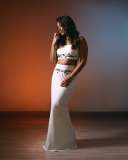 meera-nandan-in-white-fish-cut-skirt-with-crop-top-style-photos-001
