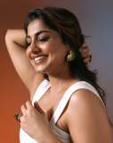 meera-nandan-in-white-fish-cut-skirt-with-crop-top-style-photos-003