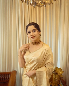 miya-george-in-golden-clour-saree-photos-003