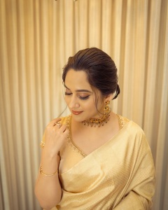 miya-george-in-golden-clour-saree-photos-005