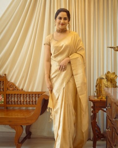 miya-george-in-golden-clour-saree-photos-007