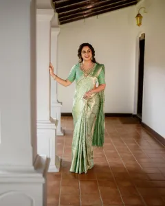 miya-george-in-pista-green-colour-pattu-saree-photos-004