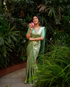 miya-george-in-pista-green-colour-pattu-saree-photos-005