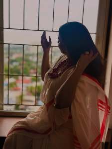 mrudula-murali-in-kerala-saree-with-red-border-and-ornaments-photos-008