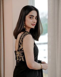 namitha-pramod-in-black-saree-with-sleeveless-heavy-work-blouse-photos