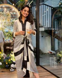 namitha-pramod-in-black-strips-in-wrap-midi-dress-photos-002
