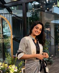 namitha-pramod-in-black-strips-in-wrap-midi-dress-photos-004