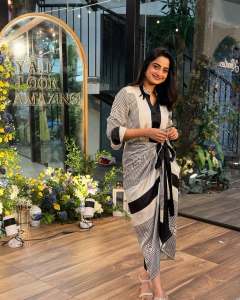namitha-pramod-in-black-strips-in-wrap-midi-dress-photos