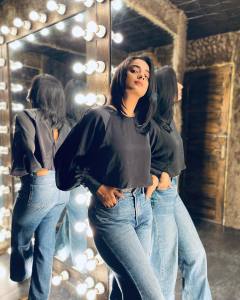 namitha-pramod-in-black-top-and-jeans-photos-004