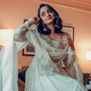 namitha-pramod-in-off-white-churidar-dress-photos-005