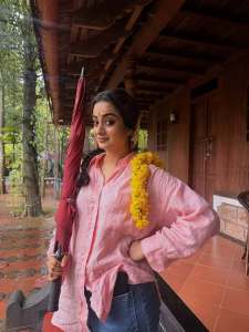 namitha-pramod-in-peach-colour-shirt-with-jeans-outfit-photos-004