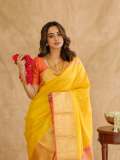 namitha-pramod-in-bright-sunny-yellow-silk-saree-with-contrasting-solid-coral-orange-silk-blouse-with-plain-short-sleeves-and-a-scoop-neck-001