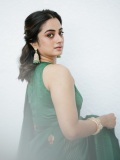 namitha-pramod-in-rich-emerald-green-fabric-with-a-subtle-sheen-characteristic-of-fine-silk-saree-Paired-with-a-matching-sleeveless-round-neck-blouse-photos-new