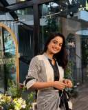 namitha-pramod-in-black-strips-in-wrap-midi-dress-photos-004