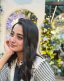 namitha-pramod-in-black-strips-in-wrap-midi-dress-photos-005