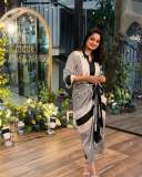 namitha-pramod-in-black-strips-in-wrap-midi-dress-photos