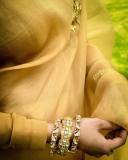 namitha-pramod-in-golden-colour-saree-and-trending-earrings-photos-003