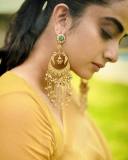 namitha-pramod-in-golden-colour-saree-and-trending-earrings-photos-006