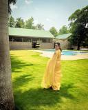 namitha-pramod-in-golden-colour-saree-and-trending-earrings-photos-009