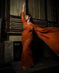 navya-nair-in-orange-color-chiffon-saree-photos