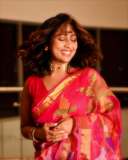navya-nair-in-in-pink-and-multi-colour-printing-saree-with-neck-choker-photos-003