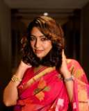 navya-nair-in-in-pink-and-multi-colour-printing-saree-with-neck-choker-photos