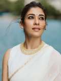nayanthara-in-white-saree-with-jasmine-flower-look-pics-001
