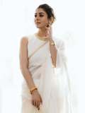 nayanthara-in-white-saree-with-jasmine-flower-look-pics-002