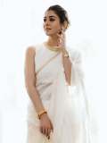 nayanthara-in-white-saree-with-jasmine-flower-look-pics-015