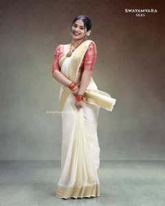 nayanthara-chakravarthy-in-onam-saree-look-photos-001
