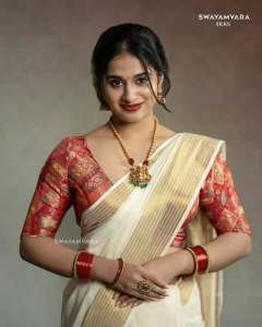 nayanthara-chakravarthy-in-onam-saree-look-photos-002