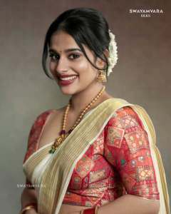 nayanthara-chakravarthy-in-onam-saree-look-photos-004