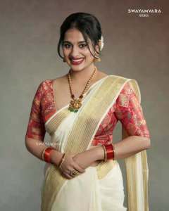 nayanthara-chakravarthy-in-onam-saree-look-photos
