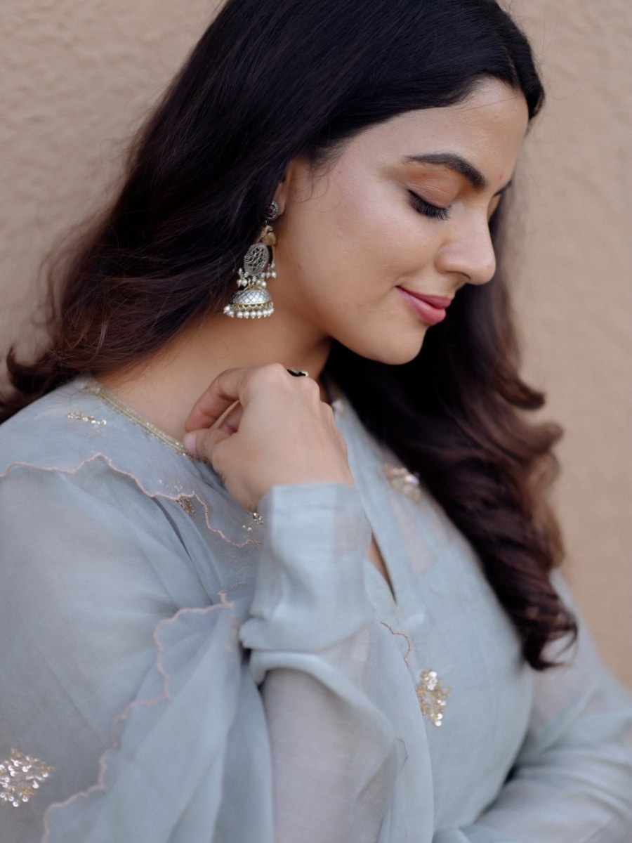 nikhila-vimal-in-pastel-gray-traditional-Indian-Anarkali-set-photos-001