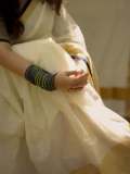 nikhila-vimal-in-check-printed-blouse-for-kerala-saree-pics-004