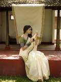 nikhila-vimal-in-check-printed-blouse-for-kerala-saree-pics-005