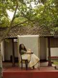 nikhila-vimal-in-check-printed-blouse-for-kerala-saree-pics-006
