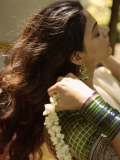 nikhila-vimal-in-check-printed-blouse-for-kerala-saree-pics-007