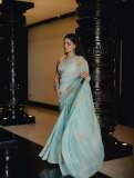 nikhila-vimal-in-lightweight-pastel-aqua-saree-with-sleeveless-V-neck-fitted-blouse-photos-005