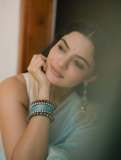 nikhila-vimal-in-lightweight-pastel-aqua-saree-with-sleeveless-V-neck-fitted-blouse-photos-007