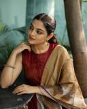 nikhila-vimal-in-maroon-churidar-with-shawl-photos-001