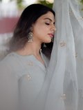 nikhila-vimal-in-pastel-gray-traditional-Indian-Anarkali-set-photos-002