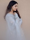 nikhila-vimal-in-pastel-gray-traditional-Indian-Anarkali-set-photos-005