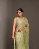 nikhila-vimal-in-pista-green-party-wear-saree-with-heavy-work-blouse-photos-005