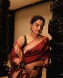 nikhila-vimal-in-rich-maroon-red-saree-with-Dark-emerald-green-or-forest-green-blouse-styling-photos-002